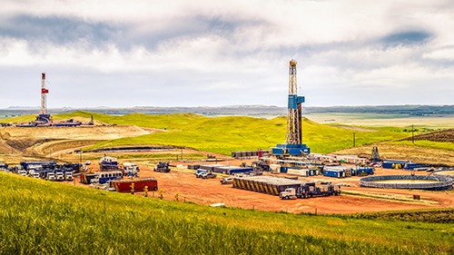 oil wells in a green field